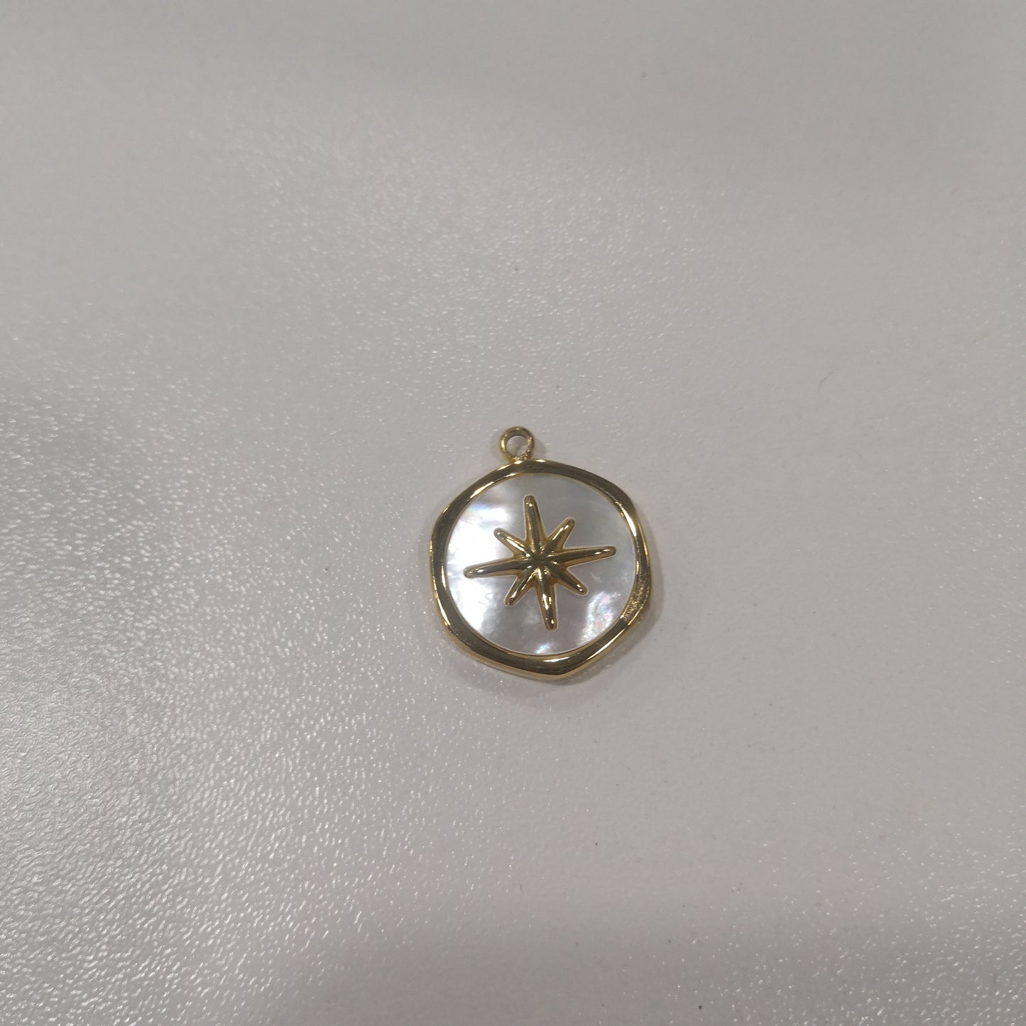 Compass pendant smooth backside with logo and front with MOP