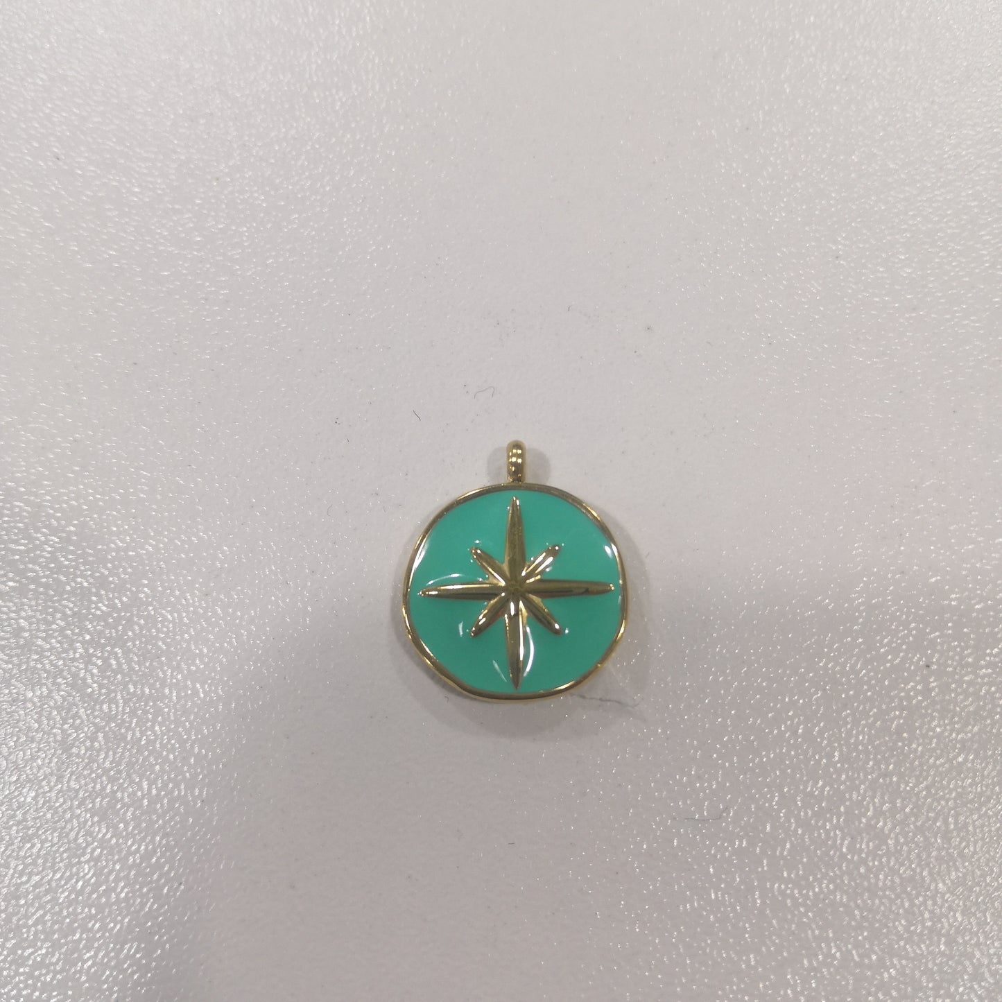 Aqua enamel pendant whit a Compass pendant