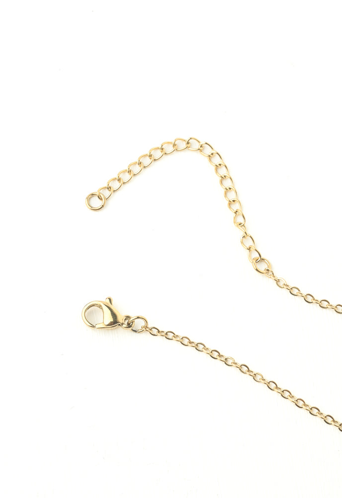 Bar necklace with 3 sun crystals etched in the gold