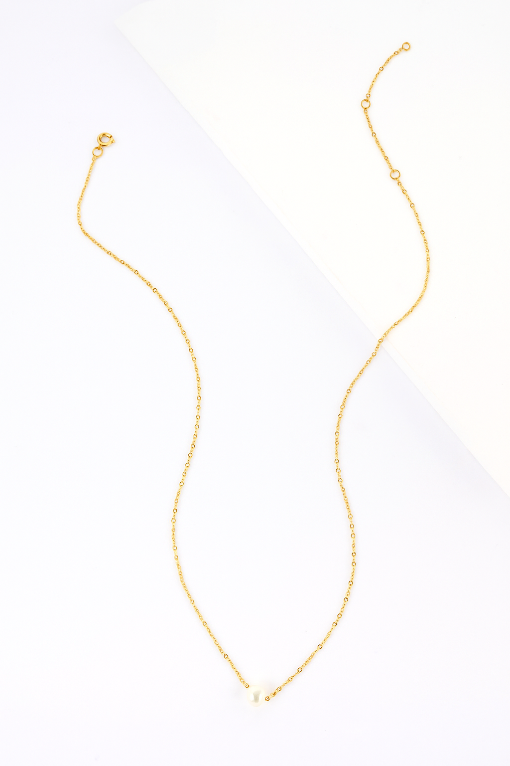 Pearl on simple gold chain