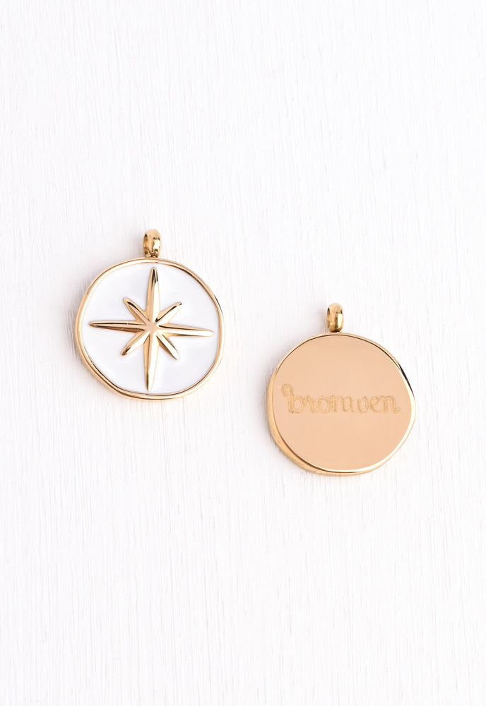 White enamel pendant with a Compass pendant