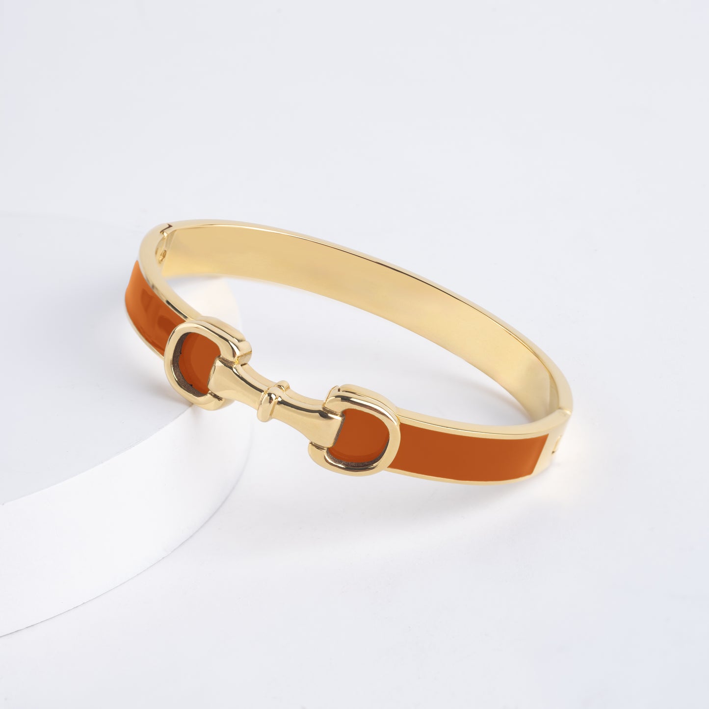 Burnt orange horse bit cuff