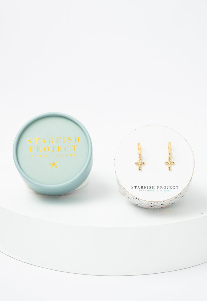 Shimmering Cross Huggie Earrings in Gold