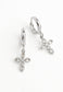 Shimmering Cross Huggie Earrings in Platinum