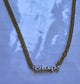 Chaps necklace with white enamel