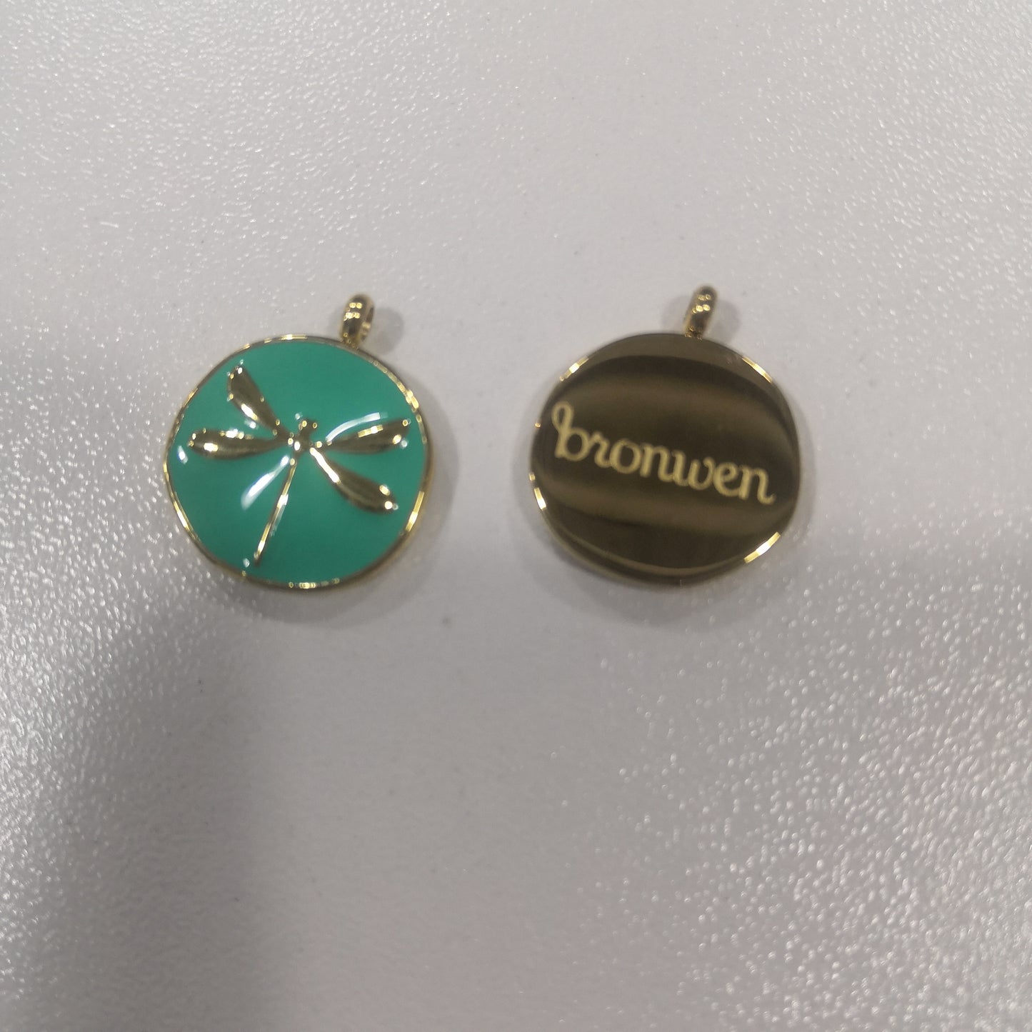 Aqua enamel pendant with a dragonfly
