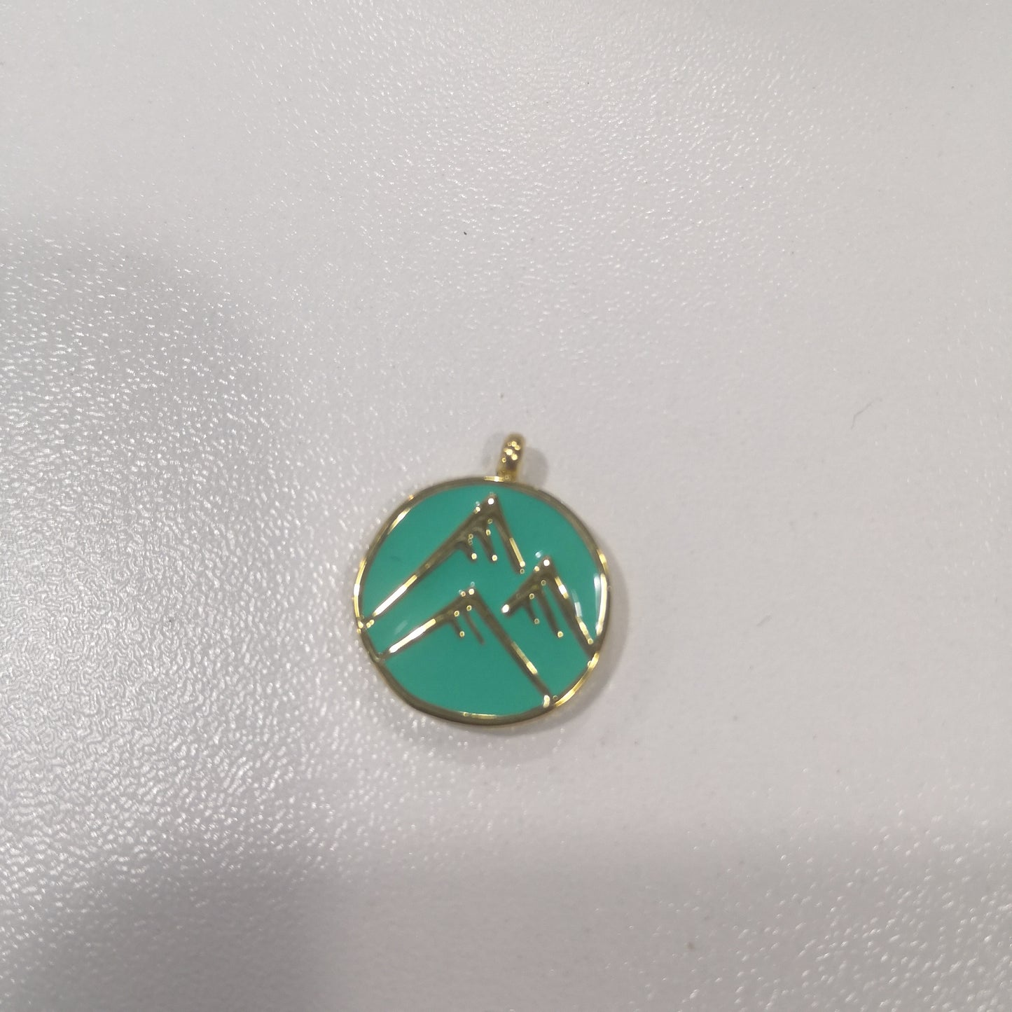 Aqua enamel pendant with a Triple Mountain pendant