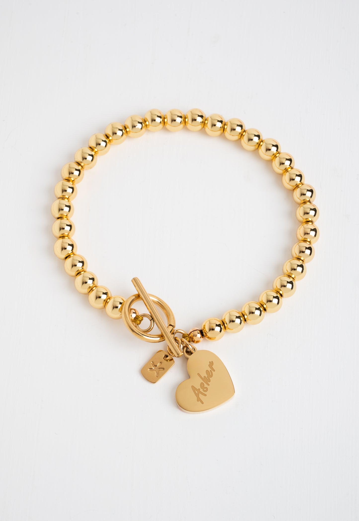Engravable Heart Pendant on Handbeaded Gold Bracelet
