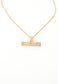 Bar necklace with 3 sun crystals etched in the gold