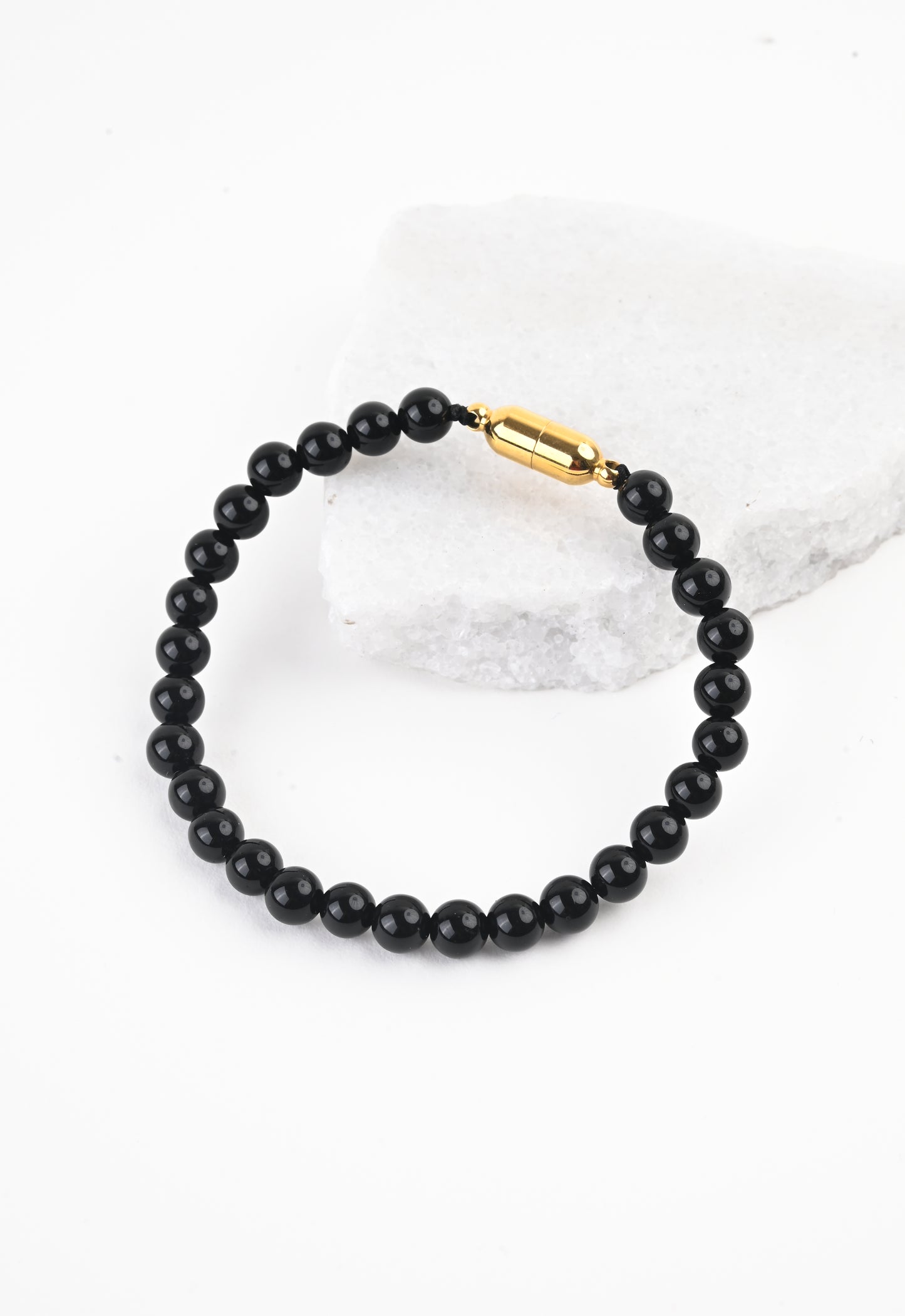 Black agate beads  bracelet with gold closures