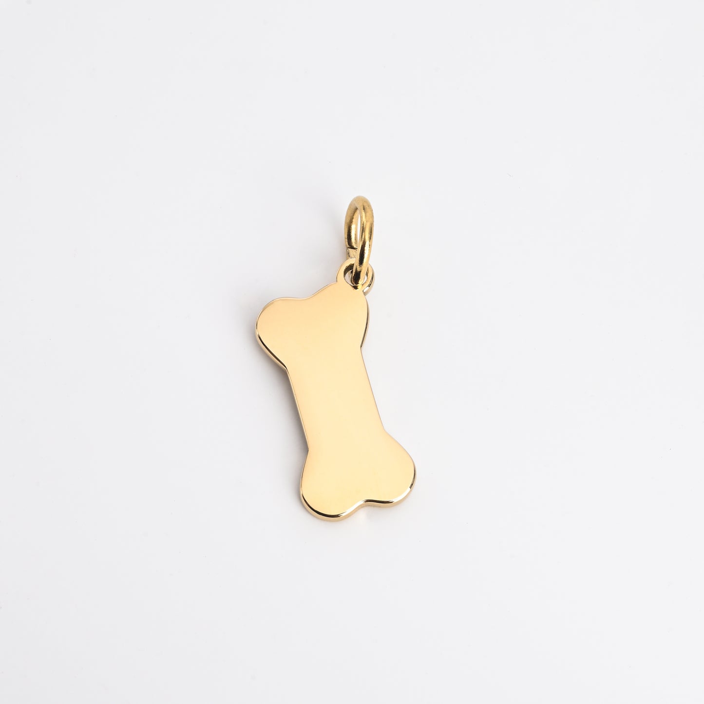 Bone-shaped charm