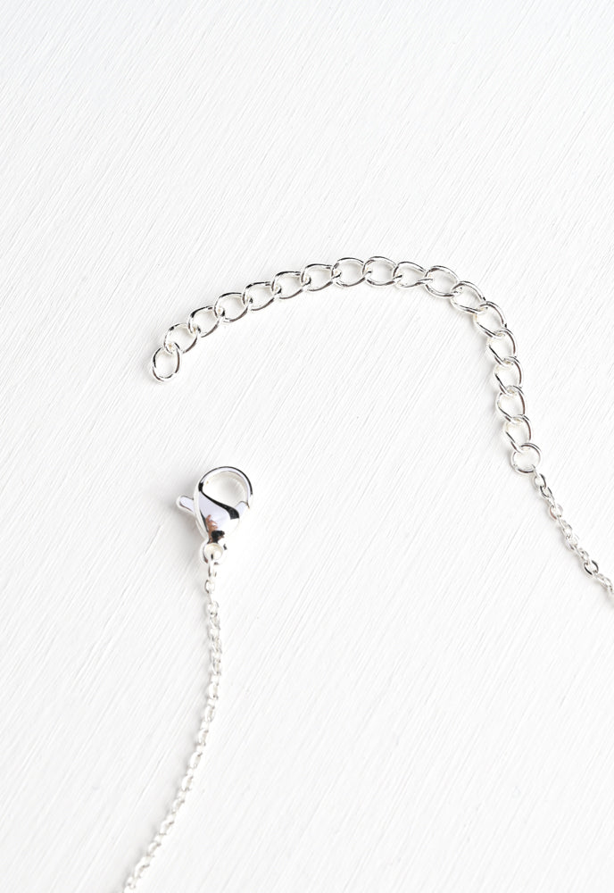 Bright silver plated bike necklace