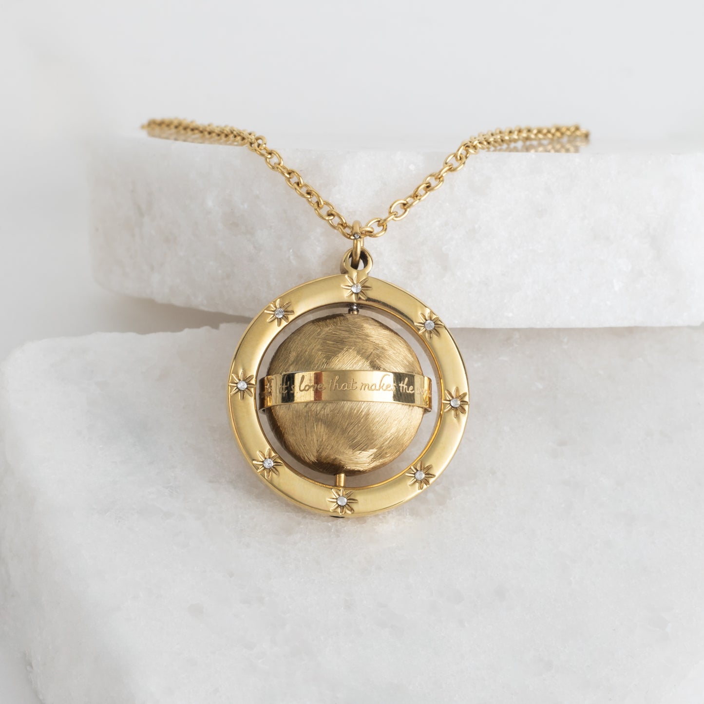 Love Makes The World Go Round Pendant