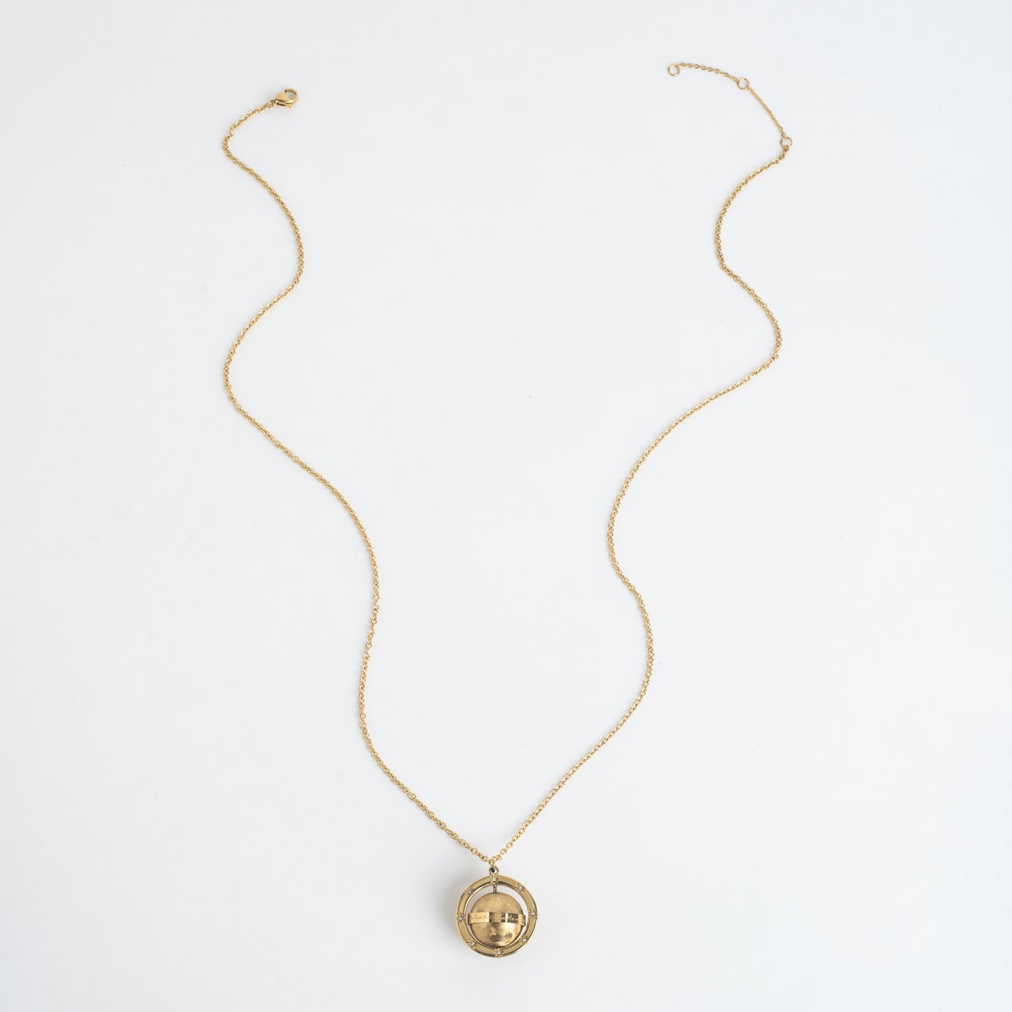 Love Makes The World Go Round Pendant