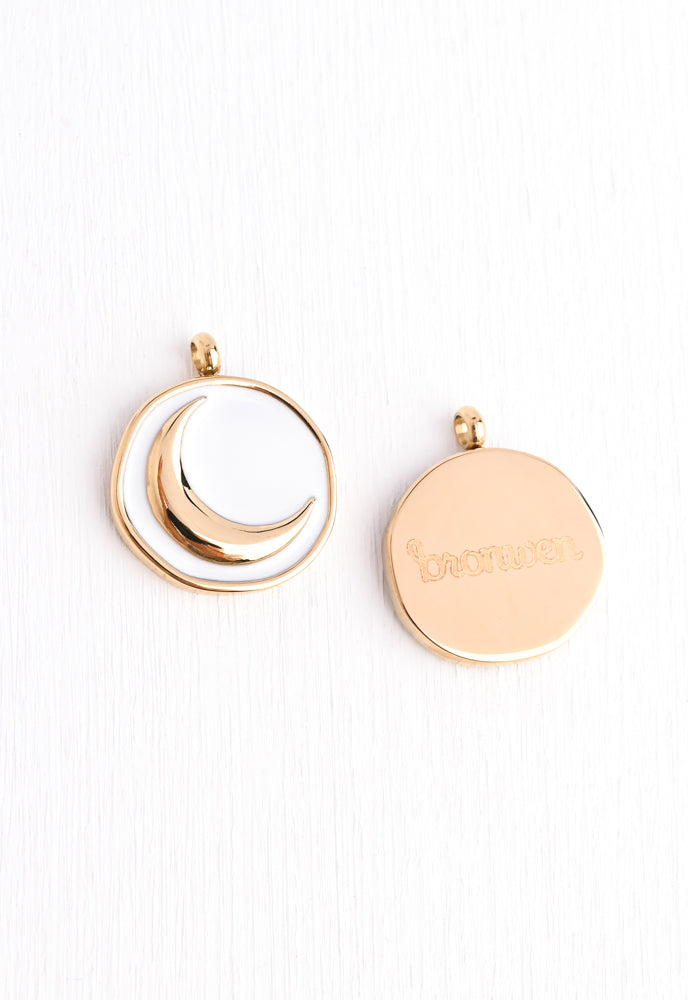 White enamel pendant whit a Moon pendant