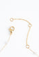 Floating cross, o-centered on chain with loosely spaced pearls necklace