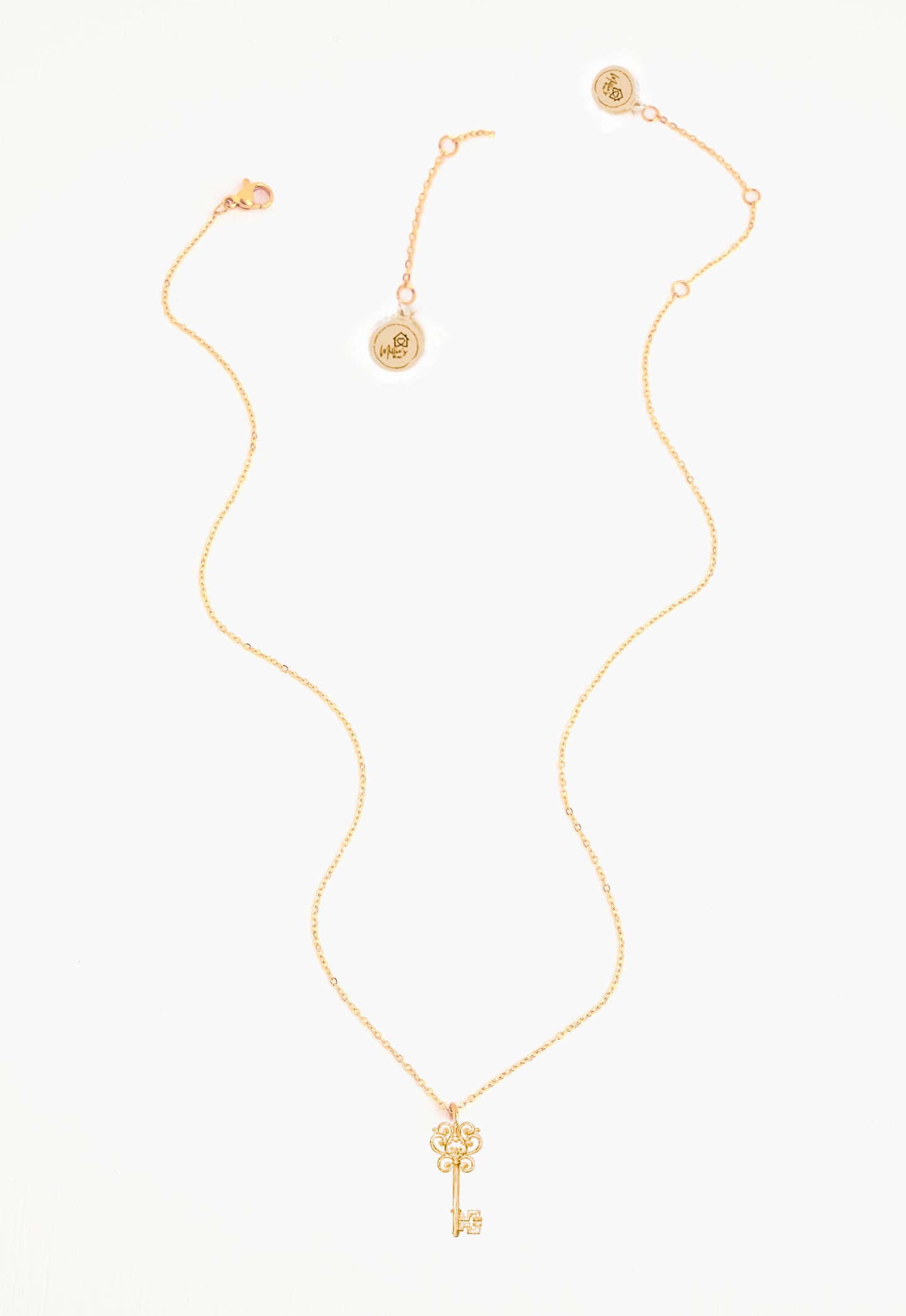 Key necklace with a round pendant