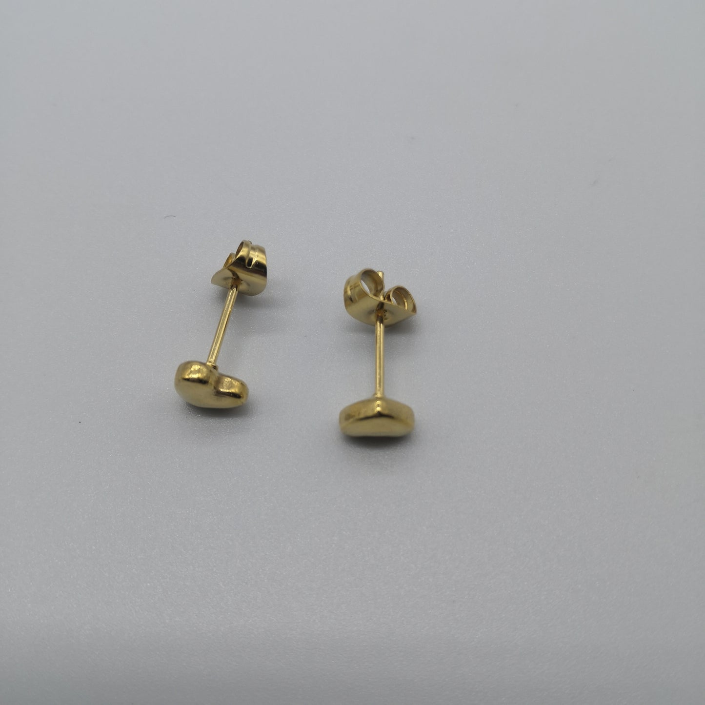 Gold heart studs (no color in middle)